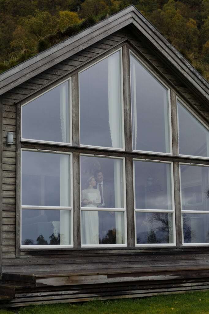 couple in their beautiful cabin surrounded by nature