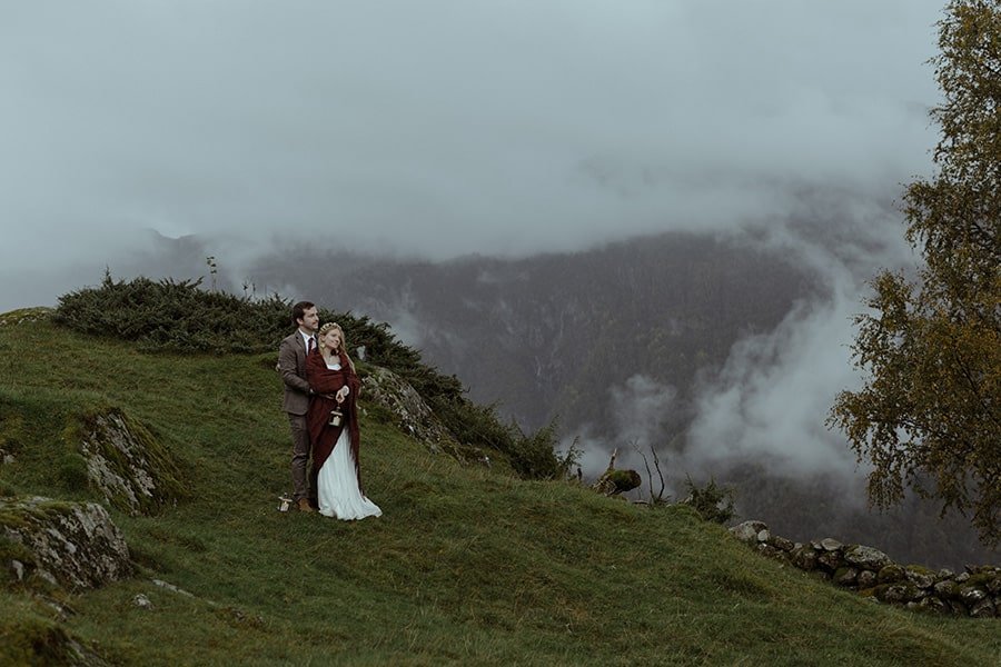 Scandinavian wedding mood with a couple holding lanterns